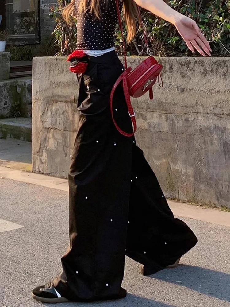 New Korean High-end Black Decorative Pearl Wide Leg Pants for Women 2025 Summer High Waisted Hanging Pants
New Korean High-end Black Decorative Pearl Wide Leg Pants for Women 2025 Summer High Waisted Hanging Pants