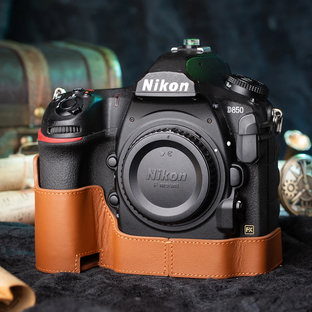 Получехол для камеры из натуральной кожи для Nikon D850, кожаный чехол для камеры D850, защитный чехол, аксессуары для фотосъемки
Получехол для камеры из натуральной кожи для Nikon D850, кожаный чехол для камеры D850, защитный чехол, аксессуары для фотосъемки