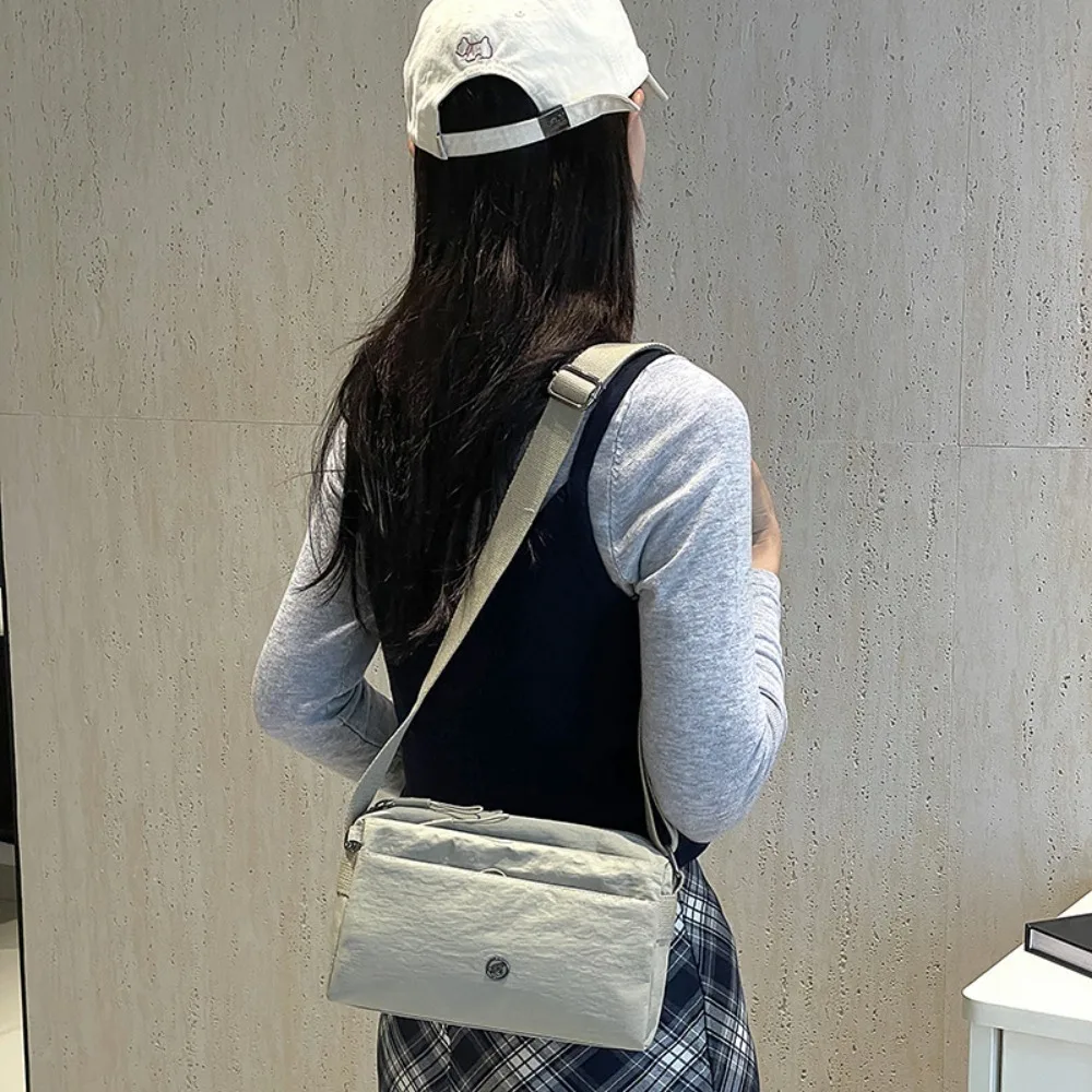 Large Capacity Nylon Cloth Messenger Bag Casual Korean Style Crossbody Square Bag Simple Waterproof Single Shoulder Bag Outdoor
Large Capacity Nylon Cloth Messenger Bag Casual Korean Style Crossbody Square Bag Simple Waterproof Single Shoulder Bag Outdoor