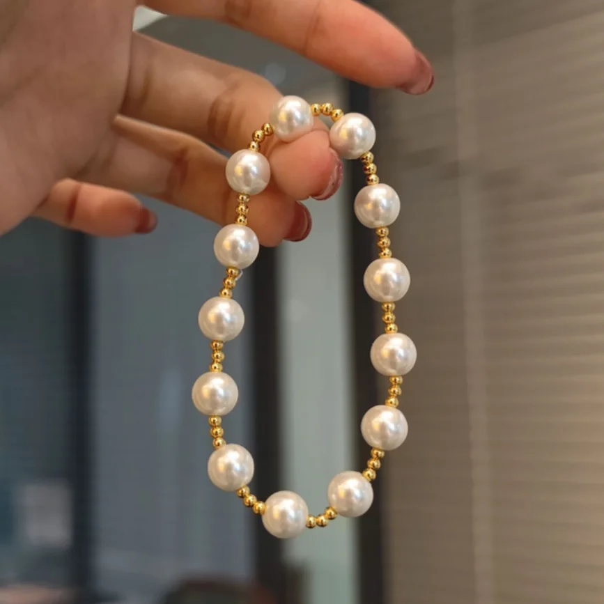 НОВЫЙ ЗАРЯДНЫЙ БРАСЛЕТ С НАТУРАЛЬНЫМ БЕЛЫМ КРУГЛЫМ ЖЕМЧУГОМ 7-8 ММ 6,5 ДЮЙМОВ 
НОВЫЙ ЗАРЯДНЫЙ БРАСЛЕТ С НАТУРАЛЬНЫМ БЕЛЫМ КРУГЛЫМ ЖЕМЧУГОМ 7-8 ММ 6,5 ДЮЙМОВ