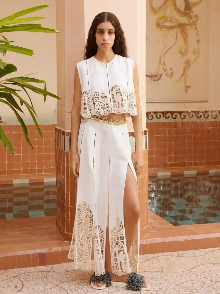SUSAN Linen Hollow out Embroidered Top Skirt Set Spring Fashion Women's Miniature Vacation Style off White Vest Skirt Set
SUSAN Linen Hollow out Embroidered Top Skirt Set Spring Fashion Women's Miniature Vacation Style off White Vest Skirt Set