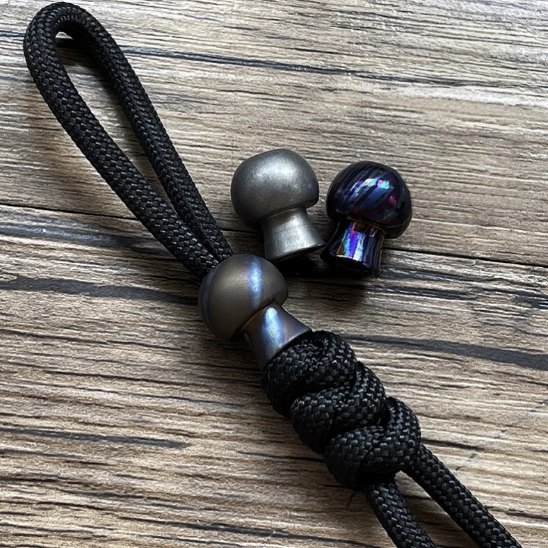 Titanium Mini Mushroom Pendant Umbrella rope Bead Lanyard Flashlight pendant
Titanium Mini Mushroom Pendant Umbrella rope Bead Lanyard Flashlight pendant