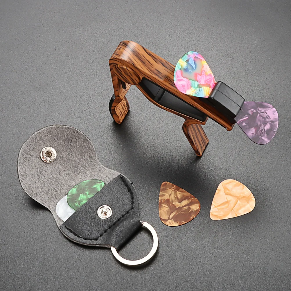 Capo Pick Guitar Holder Multi-function Ukulele Portable Picks Clamp Part Professional with Useful Accessory
Capo Pick Guitar Holder Multi-function Ukulele Portable Picks Clamp Part Professional with Useful Accessory