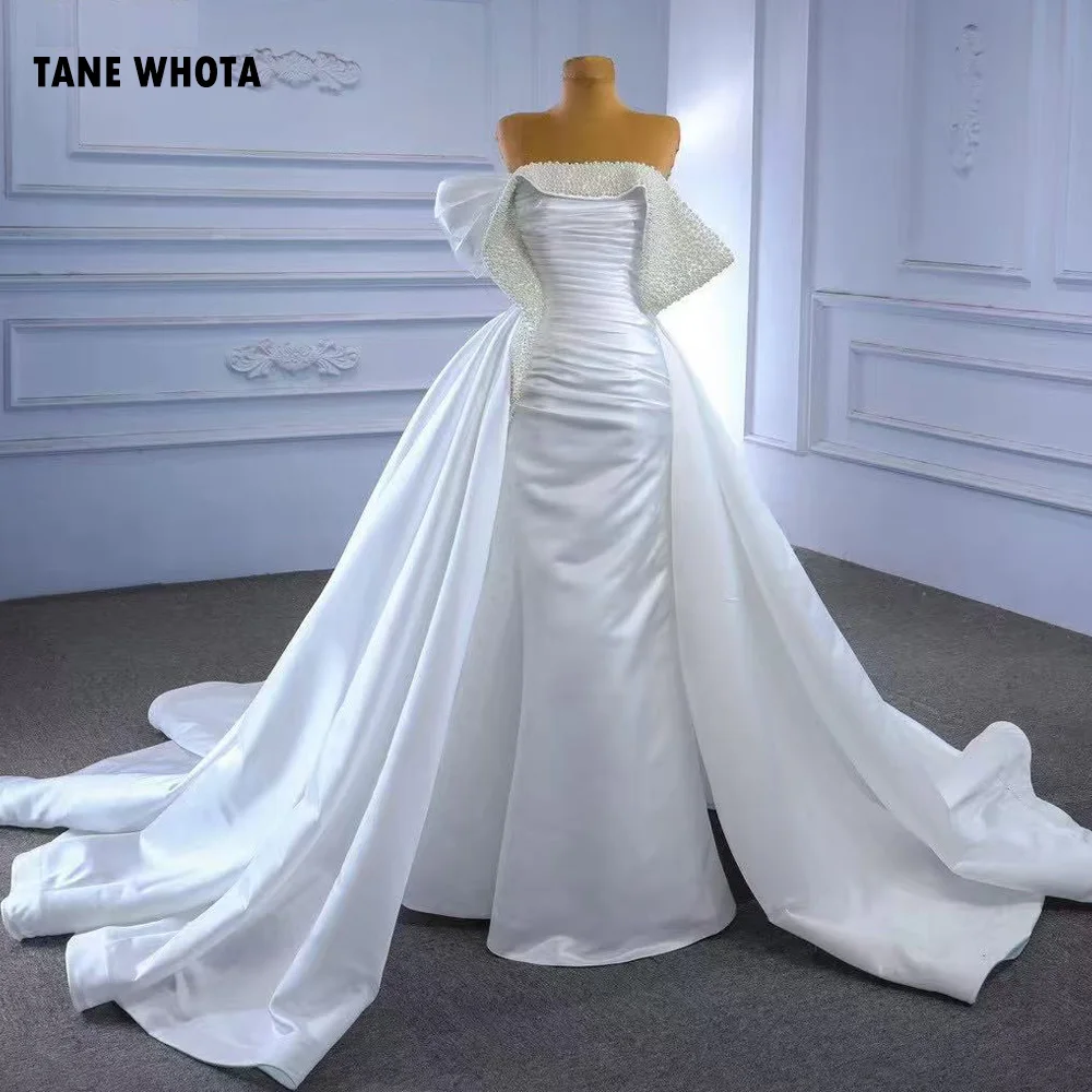 Vestidos De Novias без бретелек на шнуровке сзади с бисером и рюшами по индивидуальному заказу, роскошное свадебное платье
Vestidos De Novias без бретелек на шнуровке сзади с бисером и рюшами по индивидуальному заказу, роскошное свадебное платье