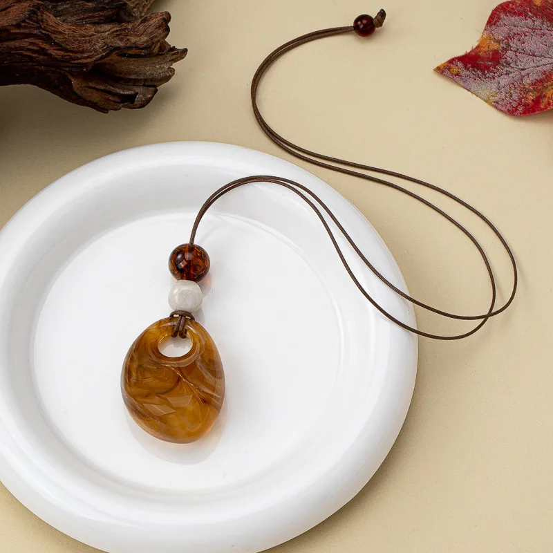 Wax Rope Water Drop Acrylic Pendant Necklace Fashion Simple Versatile Clavicle Chain Niche Personality High-end Jewelry for Wome
Wax Rope Water Drop Acrylic Pendant Necklace Fashion Simple Versatile Clavicle Chain Niche Personality High-end Jewelry for Wome