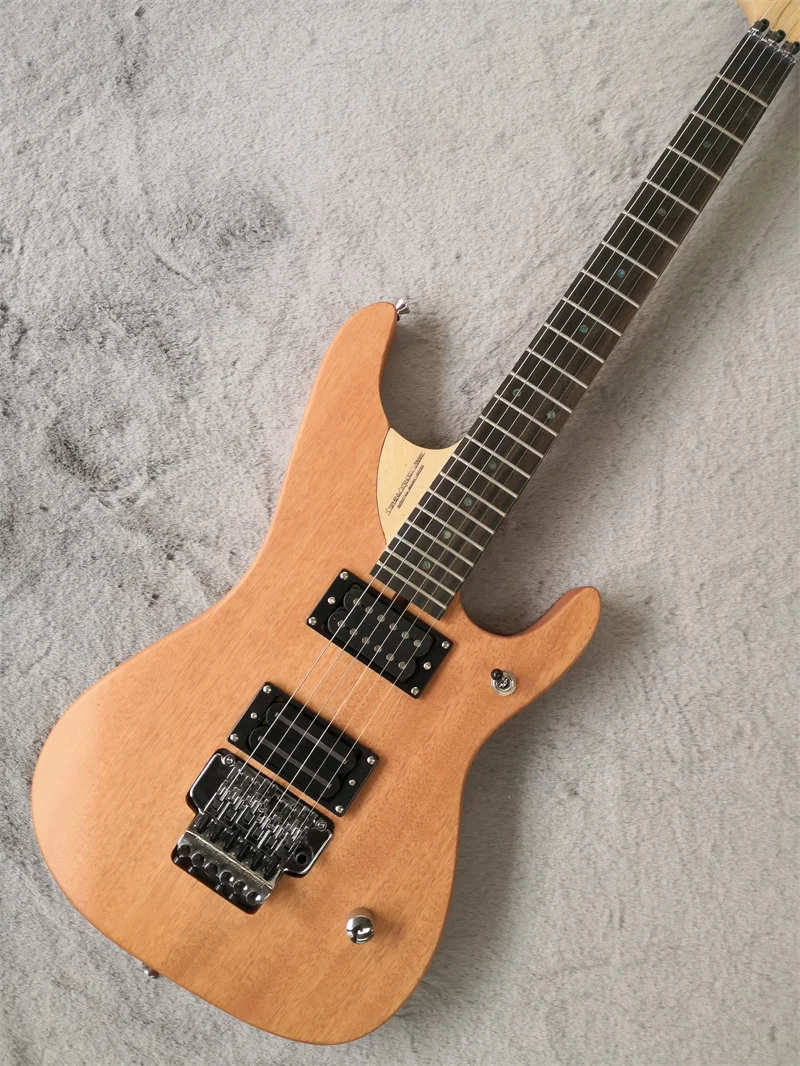 Natural matte guitar, Tremolo bridge, solid wood body, maple neck, HH pickups, rosewood fingerboard
Natural matte guitar, Tremolo bridge, solid wood body, maple neck, HH pickups, rosewood fingerboard
