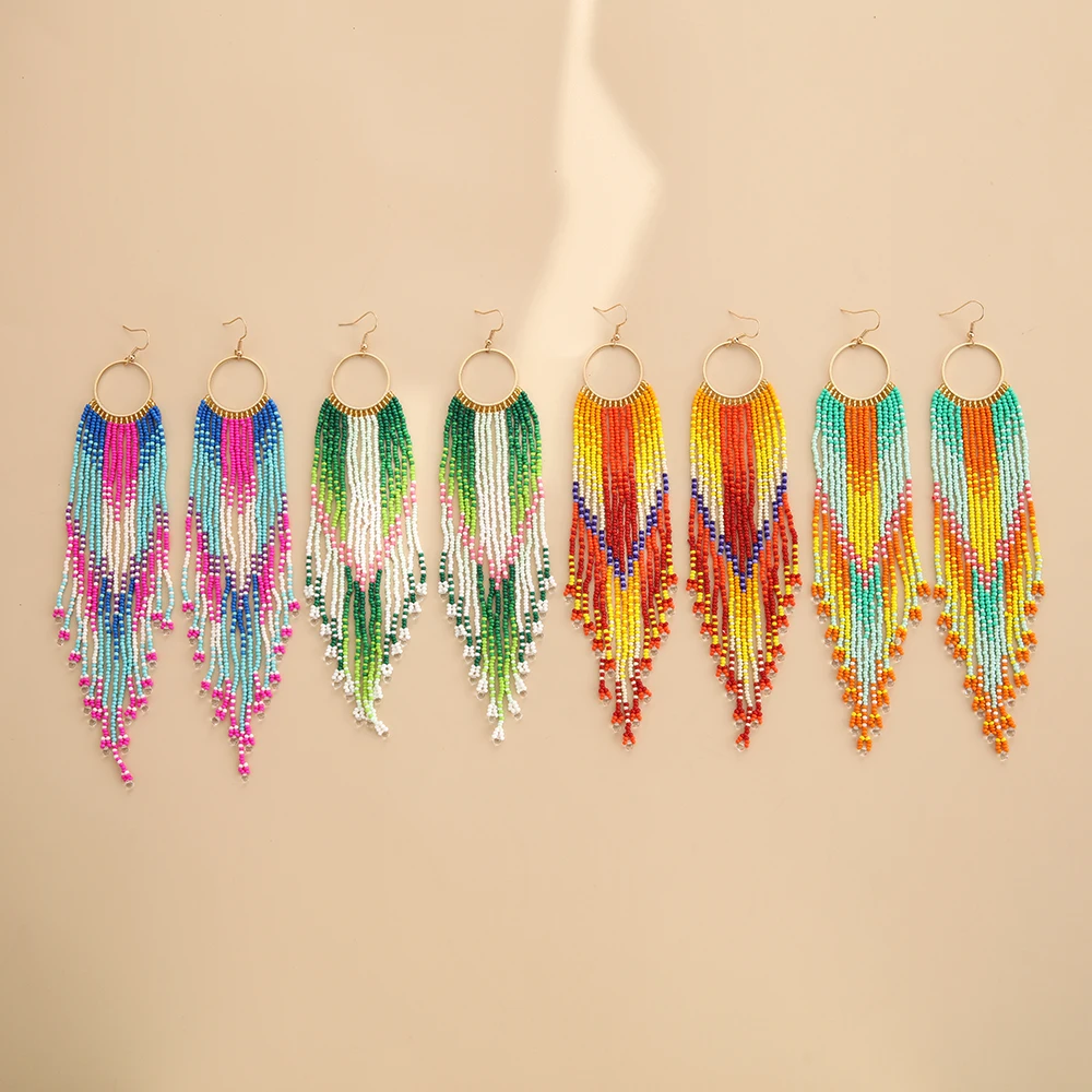 Beaded earrings Tassel Rainbow Circle Originality Gradient Hand knitting Bohemia Alloy Tide Simple Rice bead earrings
Beaded earrings Tassel Rainbow Circle Originality Gradient Hand knitting Bohemia Alloy Tide Simple Rice bead earrings