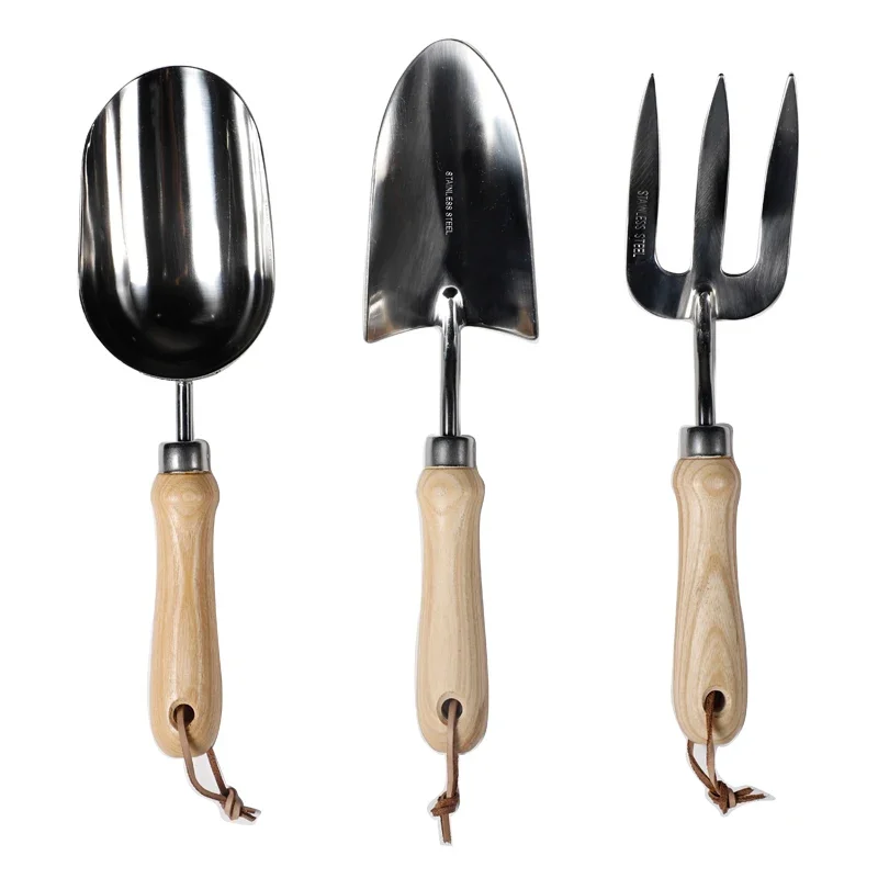Gardening tool set Small shovel Stainless steel planting and digging household three-piece flower planting shovel
Gardening tool set Small shovel Stainless steel planting and digging household three-piece flower planting shovel