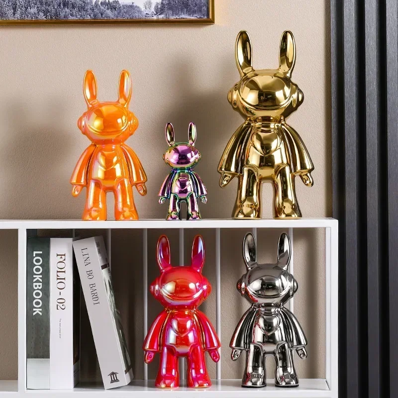 Space rabbit ceramic doll, fashionable piggy bank, animal sculpture, cool decoration for home TV cabinet living room, gift.
Space rabbit ceramic doll, fashionable piggy bank, animal sculpture, cool decoration for home TV cabinet living room, gift.
