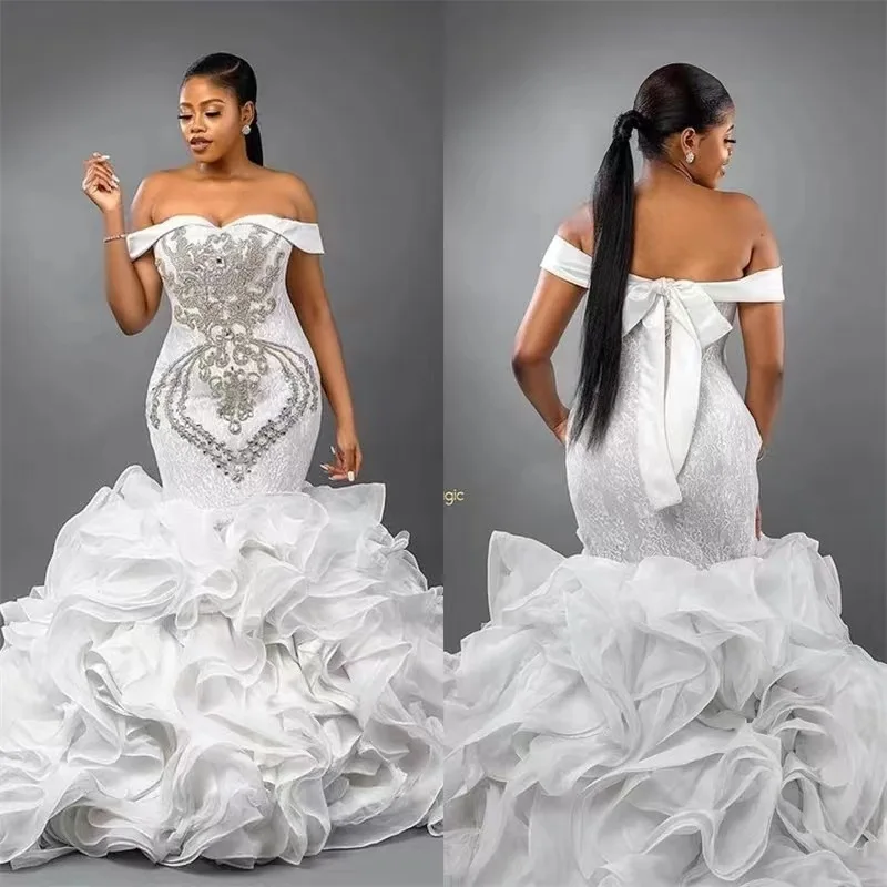 Luxury African Mermaid Wedding Dress 2025 Bridal Gowns Off the Shoulder Crystal Tiered Organza Customed Vestidos De Noiva
Luxury African Mermaid Wedding Dress 2025 Bridal Gowns Off the Shoulder Crystal Tiered Organza Customed Vestidos De Noiva