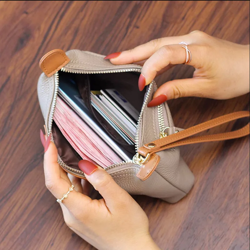 Leather clutch bag Femininity can put mobile phone cowhide wrist strap soft leather zipper long wallet cosmetic bag female
Leather clutch bag Femininity can put mobile phone cowhide wrist strap soft leather zipper long wallet cosmetic bag female