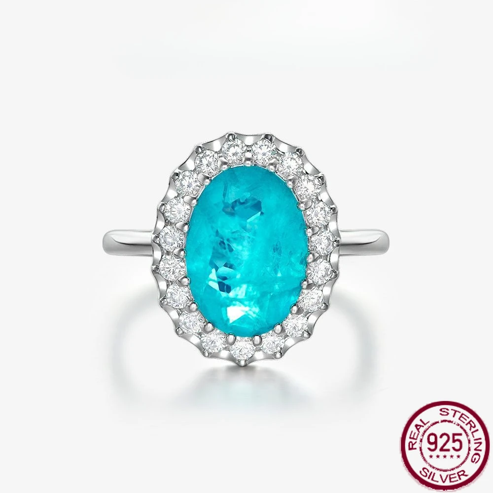 925 Silver 5-carat Synthetic Paraiba Emerald 10 * 14 Egg Shaped High Carbon Diamond Ring for Women's Wedding Jewelry
925 Silver 5-carat Synthetic Paraiba Emerald 10 * 14 Egg Shaped High Carbon Diamond Ring for Women's Wedding Jewelry
