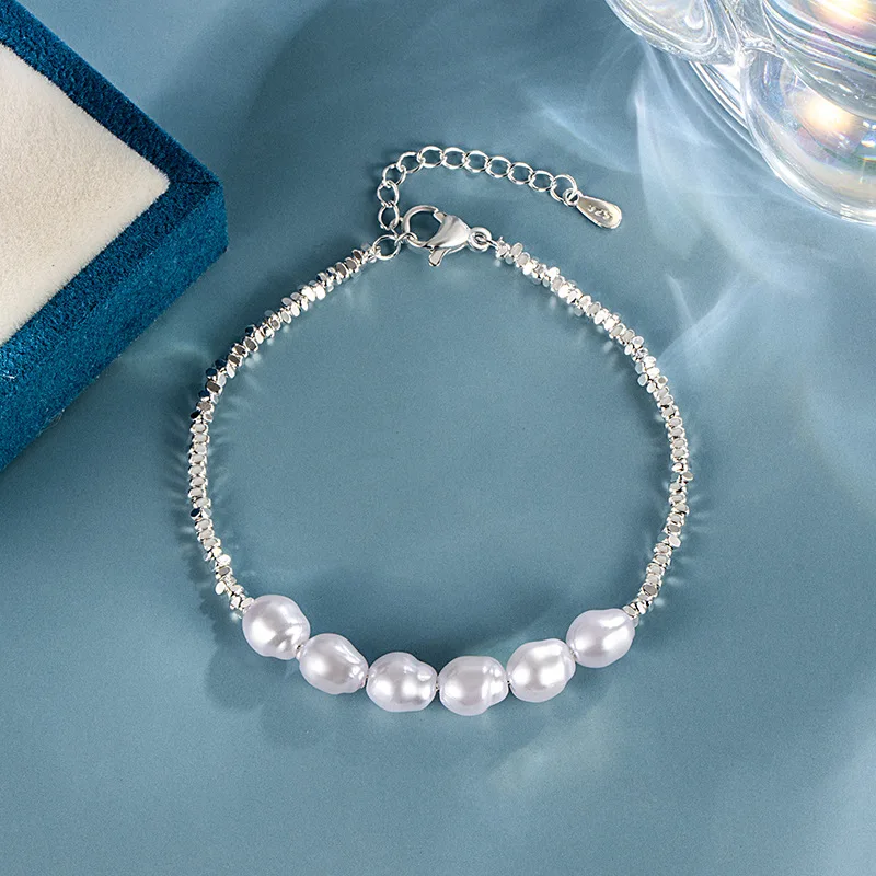Женский браслет из серебра 925 пробы, с жемчужными бусинами
Женский браслет из серебра 925 пробы, с жемчужными бусинами