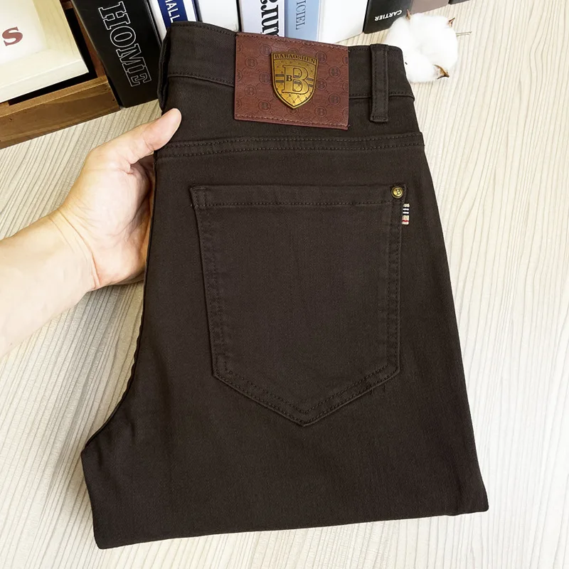 Coffee colored jeans for men simple and fashionable high-end slim fit small feet casual trend light luxury business pants
Coffee colored jeans for men simple and fashionable high-end slim fit small feet casual trend light luxury business pants