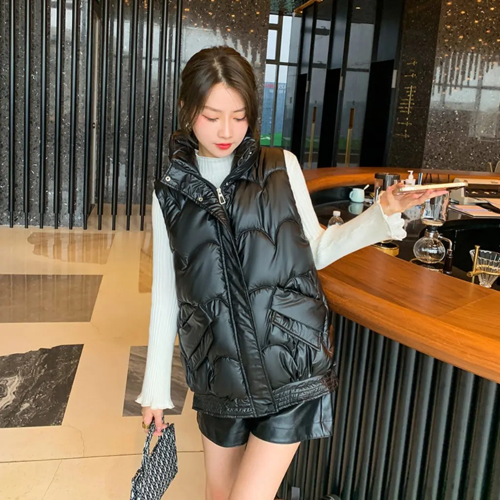 Женский короткий хлопковый жилет в корейском стиле, свободная теплая куртка без рукавов, осенне-зимняя модная повседневная верхняя одежда 
Женский короткий хлопковый жилет в корейском стиле, свободная теплая куртка без рукавов, осенне-зимняя модная повседневная верхняя одежда