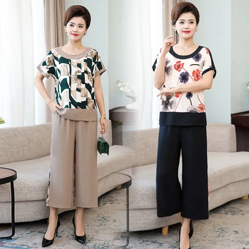 Set Female Summer New Mother Suit Short-Sleeved Tops Wide-Leg Pants Outfit Thin Section Middle-Aged Elderly Women Two-Piece Coat
Set Female Summer New Mother Suit Short-Sleeved Tops Wide-Leg Pants Outfit Thin Section Middle-Aged Elderly Women Two-Piece Coat