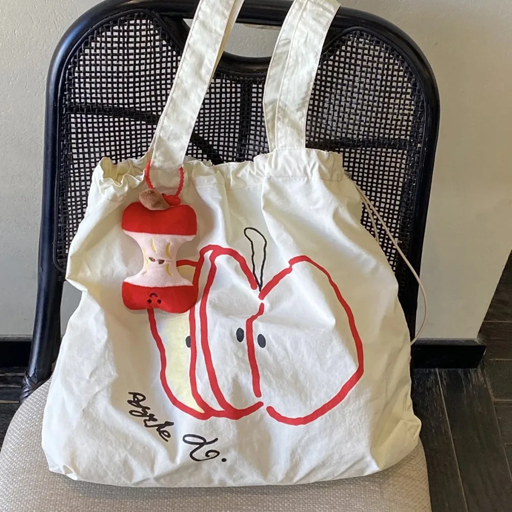 Portable Drawstring Shoulder Bag Korean Style Large Capacity Canvas Shopping Bag Fruits Printed Grocery Bag Handbag Streetwear
Portable Drawstring Shoulder Bag Korean Style Large Capacity Canvas Shopping Bag Fruits Printed Grocery Bag Handbag Streetwear