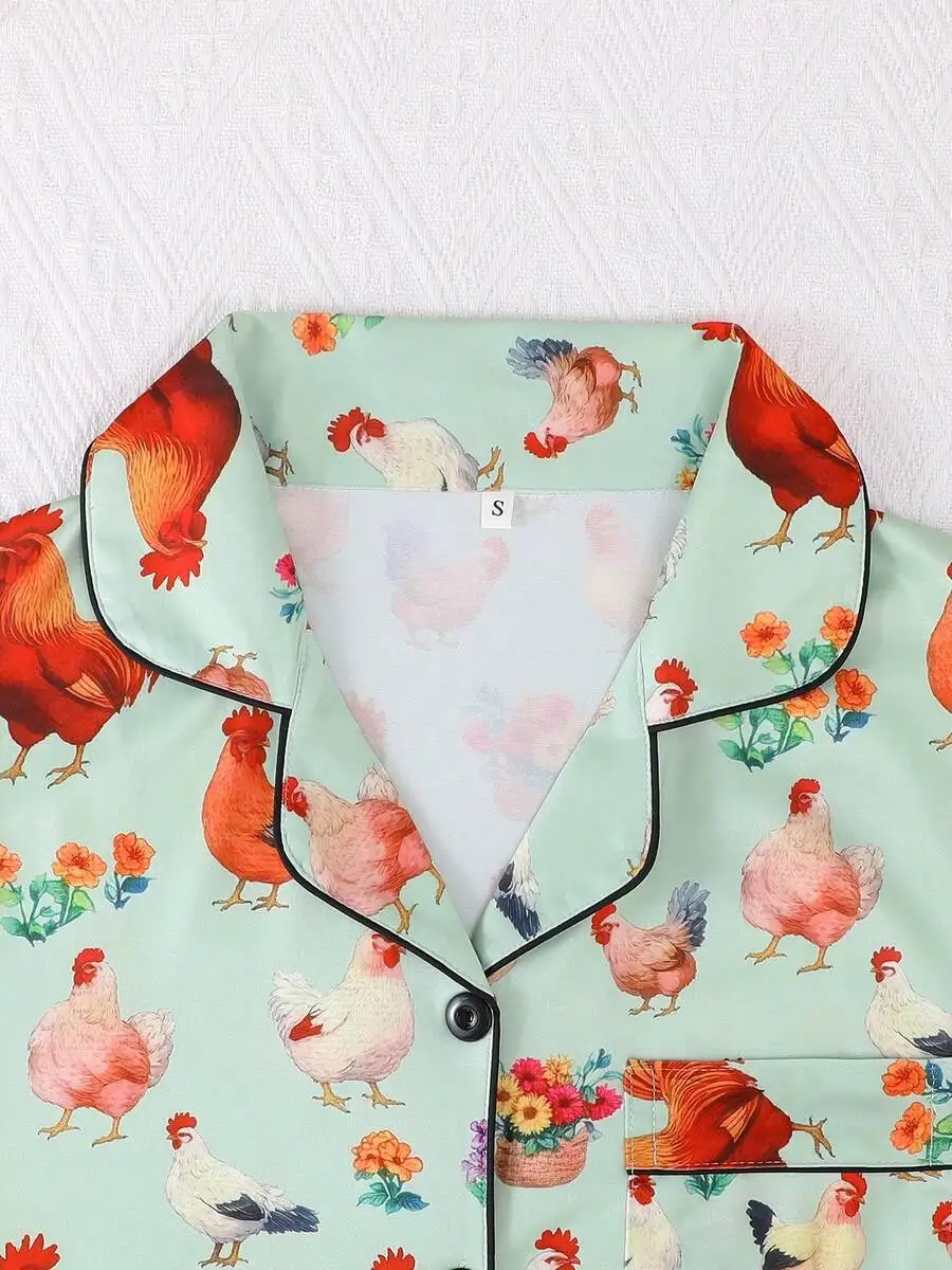 Womens 2-Piece Short Sleeve Pajama Set With Chicken Print Lapel Top And Elastic Waist Shorts
Womens 2-Piece Short Sleeve Pajama Set With Chicken Print Lapel Top And Elastic Waist Shorts