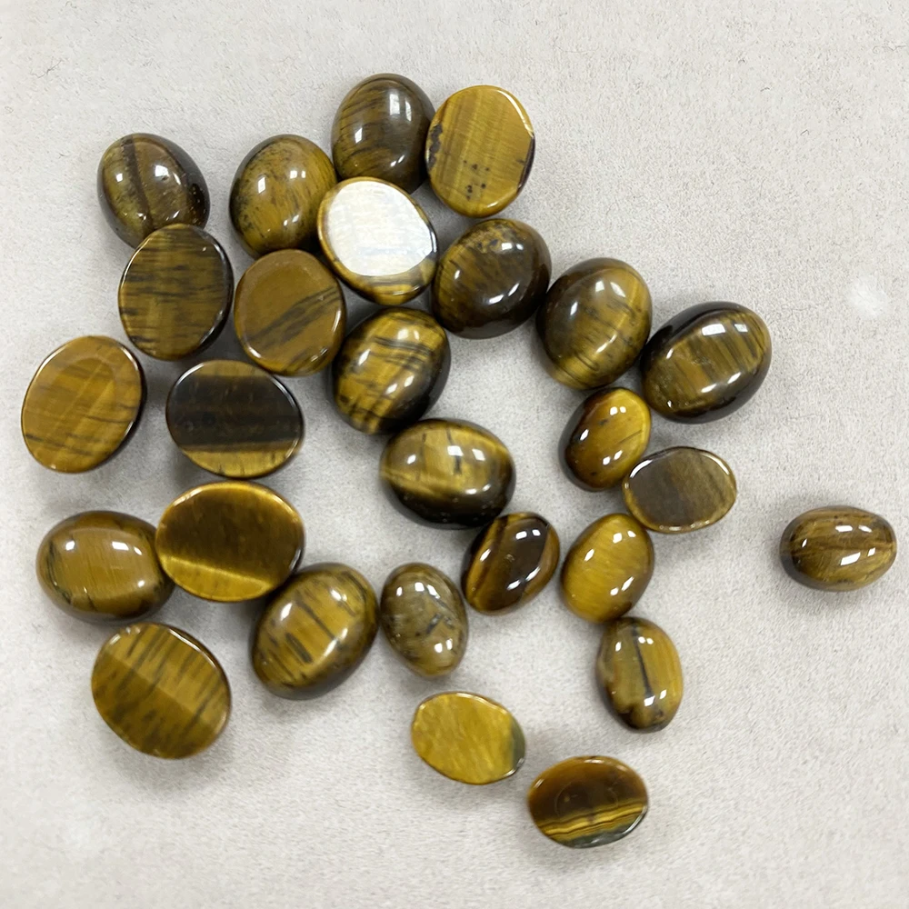 Factory Wholesale Natural Tiger Eye Stone Golden Brown Wealth Luck Cat Eye Beads Cabochon Protection Stone for Jewelry Making
Factory Wholesale Natural Tiger Eye Stone Golden Brown Wealth Luck Cat Eye Beads Cabochon Protection Stone for Jewelry Making