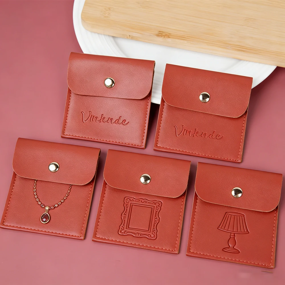 100Pcs Custom Logo Small Red Leather Jewelry Bag Bracelet Earrings Rings Gift Packaging Metal Button Snap PU Jewellery Pouch
100Pcs Custom Logo Small Red Leather Jewelry Bag Bracelet Earrings Rings Gift Packaging Metal Button Snap PU Jewellery Pouch