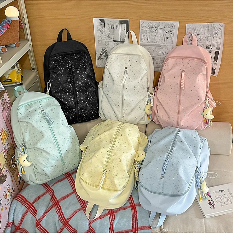 Nylon lightweight student schoolbag, simple and cute pendant, star large-capacity travel waterproof computer backpack
Nylon lightweight student schoolbag, simple and cute pendant, star large-capacity travel waterproof computer backpack