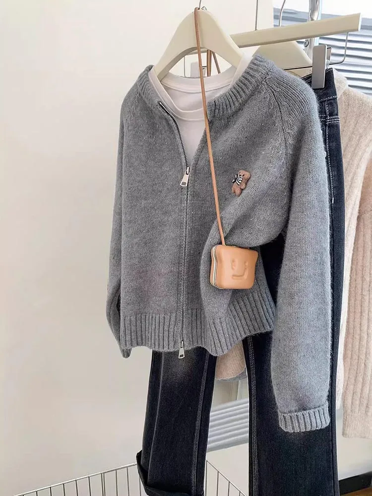 Fashion O-neck Sweater Coat Women Retro Zipper Long Sleeve Knitted Cardigan Autumn Winter Sweater Female Casual Loose Tops
Fashion O-neck Sweater Coat Women Retro Zipper Long Sleeve Knitted Cardigan Autumn Winter Sweater Female Casual Loose Tops
