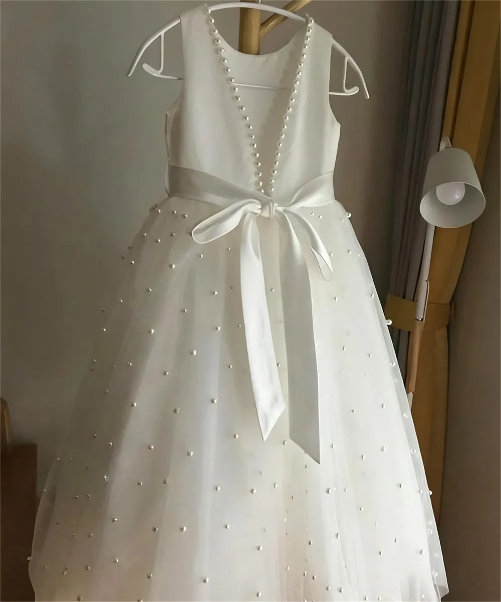 Elegant Ivory Flower Girl Wedding Dress Pearls Bow Belt V Back Sleeveless Princess Birthday Party Kids First Communion Gown
Elegant Ivory Flower Girl Wedding Dress Pearls Bow Belt V Back Sleeveless Princess Birthday Party Kids First Communion Gown
