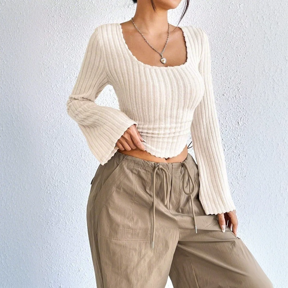 Новая женская модная элегантная футболка на осень-зиму 2026 года с круглым вырезом и расклешенными длинными рукавами
Новая женская модная элегантная футболка на осень-зиму 2026 года с круглым вырезом и расклешенными длинными рукавами