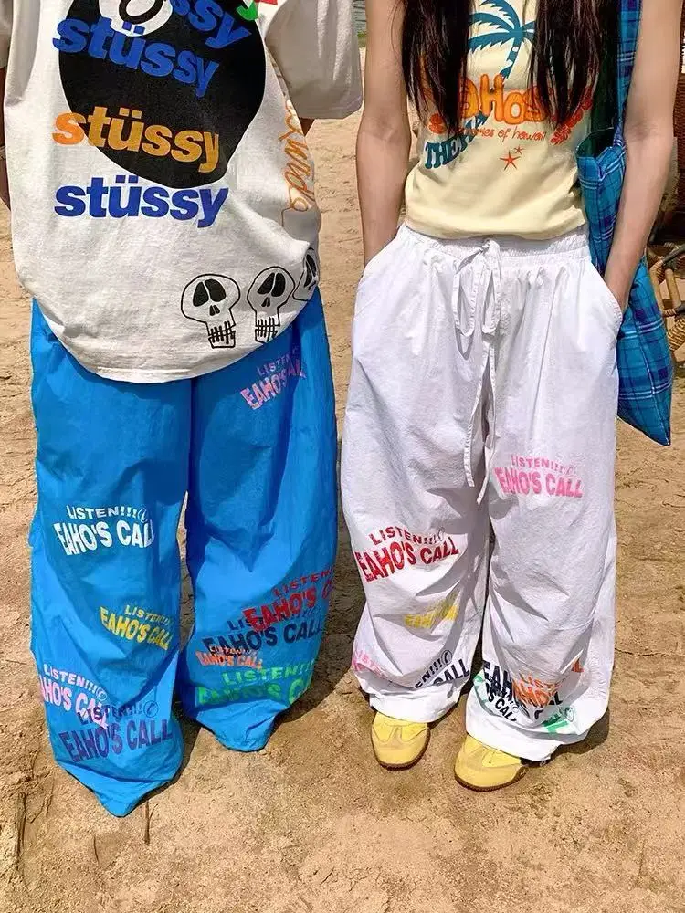 Summer new dopamine letter design sports wide-leg paratrooper pants American retro beach mopping trousers
Summer new dopamine letter design sports wide-leg paratrooper pants American retro beach mopping trousers