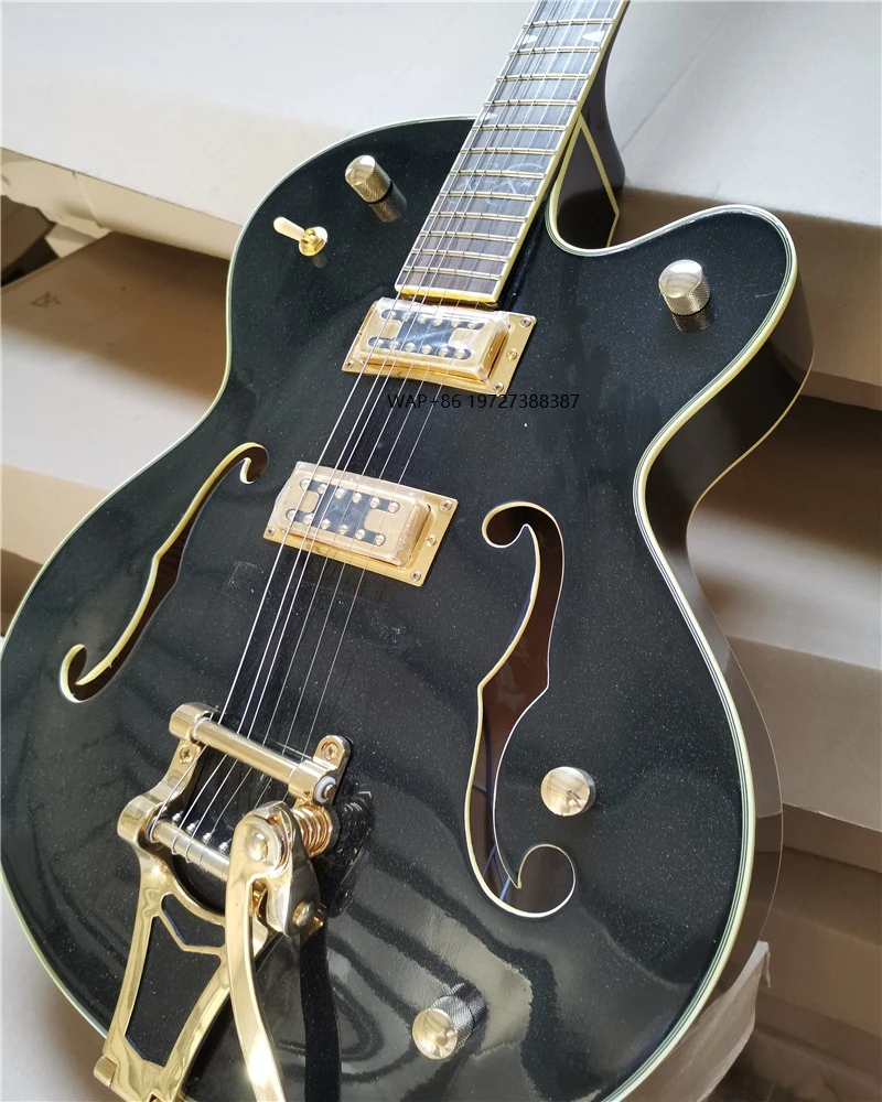 Black body Electric Guitar with Rosewood fingerboard ,Gold hardware,The guitar is in stock and can be shipped immediately
Black body Electric Guitar with Rosewood fingerboard ,Gold hardware,The guitar is in stock and can be shipped immediately