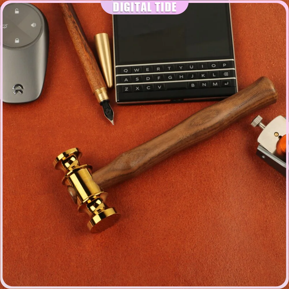 A high-quality handcrafted hammer made of 18K gold with a wooden handle. Leather-wrapped tool for assessment. Hammer.
A high-quality handcrafted hammer made of 18K gold with a wooden handle. Leather-wrapped tool for assessment. Hammer.