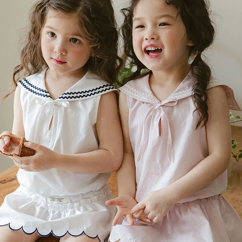 Girl's T-shirt and Shorts Set 26 Summer New Sweet and Fashionable Navy Collar Bow Short Sleeve Top Cotton Cute Lace Pants Skirt
Girl's T-shirt and Shorts Set 26 Summer New Sweet and Fashionable Navy Collar Bow Short Sleeve Top Cotton Cute Lace Pants Skirt