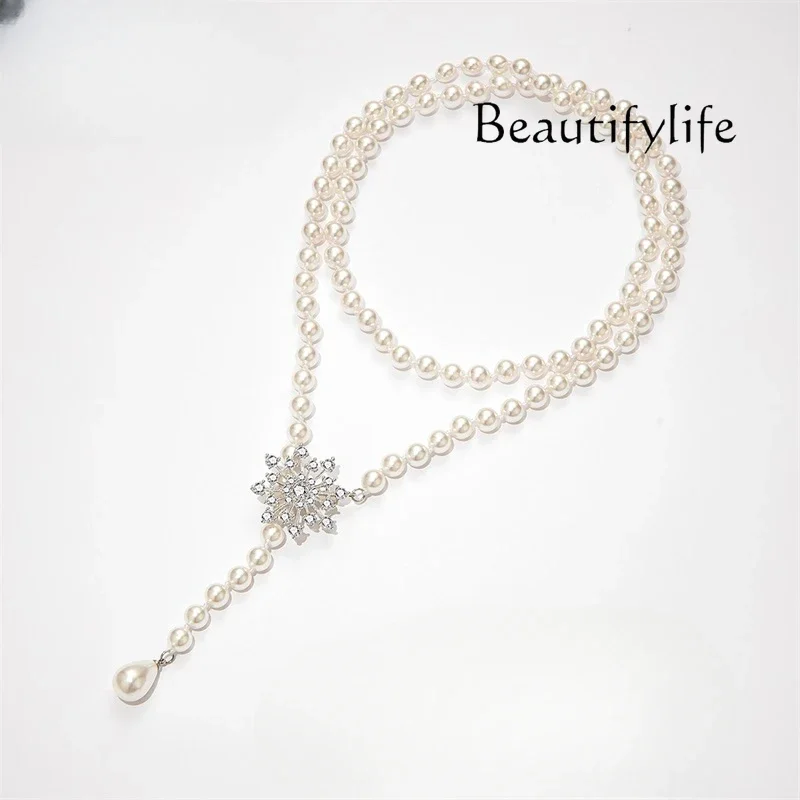 Snowflake sweater chain pearl necklace new women's light luxury high-end neck chain jewelry accessories
Snowflake sweater chain pearl necklace new women's light luxury high-end neck chain jewelry accessories