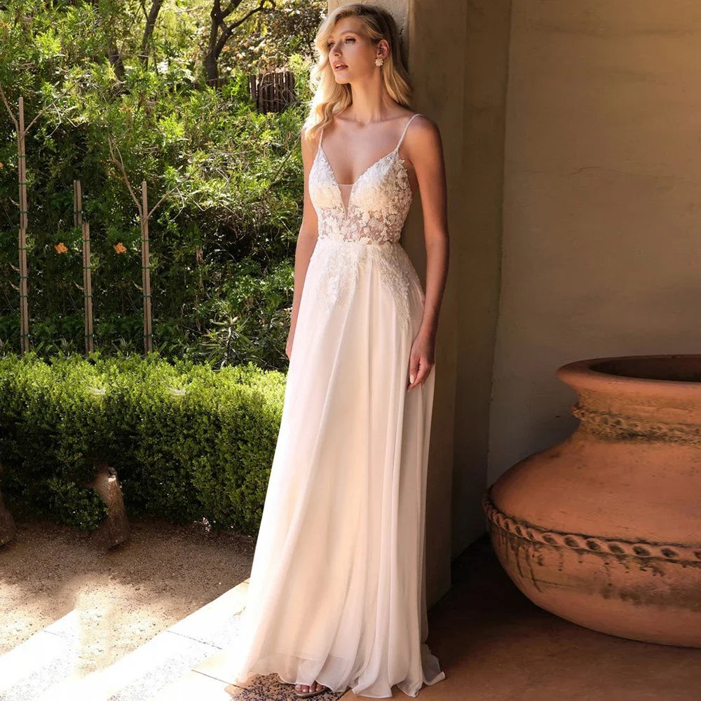Elegant V-Neck Wedding Dresses A-Line Spaghetti Strap Backless Robe De Mariée Lace Appliques Chiffon Bridal Gowns Sweep Train
Elegant V-Neck Wedding Dresses A-Line Spaghetti Strap Backless Robe De Mariée Lace Appliques Chiffon Bridal Gowns Sweep Train