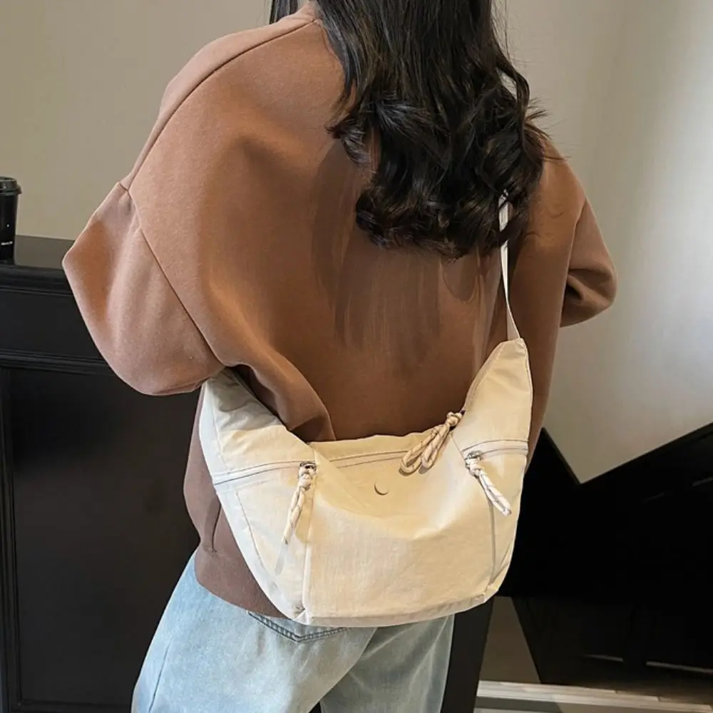 Large Capacity Nylon Dumpling Bag Japanese Style Multiple Pockets Casual Crossbody Bag Purse Solid Color Sports Shoulder Bag
Large Capacity Nylon Dumpling Bag Japanese Style Multiple Pockets Casual Crossbody Bag Purse Solid Color Sports Shoulder Bag