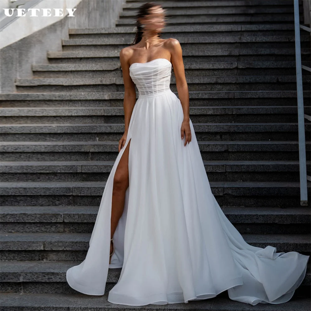 UETEEY Customized Pleats High Side Slit Strapless Organza Wedding Dress Women A Line Zipper Back Court Train Bridal Gown
UETEEY Customized Pleats High Side Slit Strapless Organza Wedding Dress Women A Line Zipper Back Court Train Bridal Gown