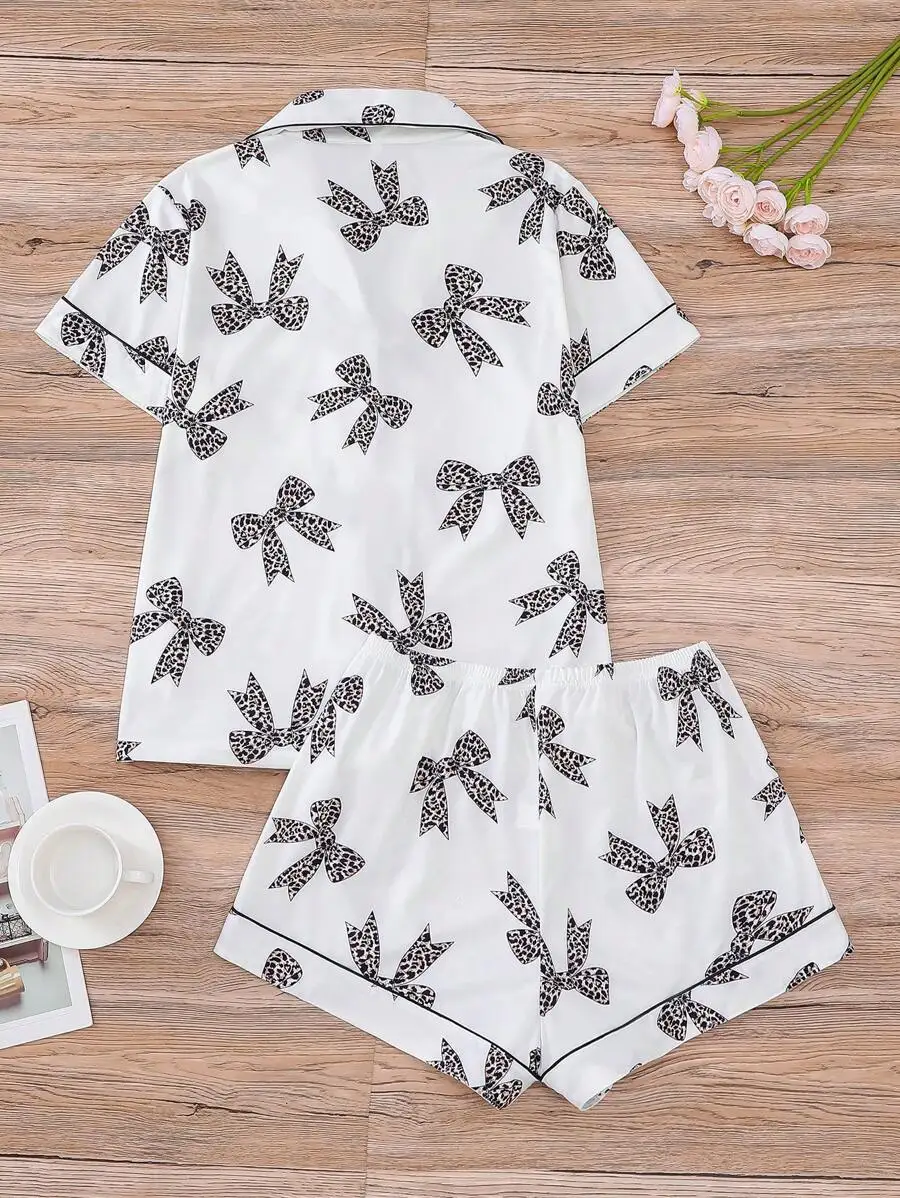 Women 2pcs Bow Print Pajama Set Short Sleeve Shirt With Lapel Collar And Elastic Waist Shorts
Women 2pcs Bow Print Pajama Set Short Sleeve Shirt With Lapel Collar And Elastic Waist Shorts