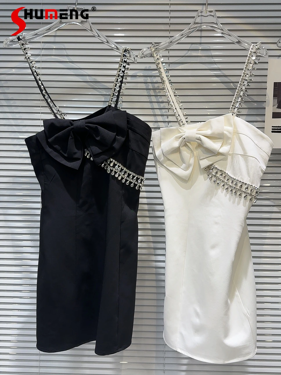 Women's Dresses 2024 Summer New Fashion Dresses Female Socialite Bow Drop-Shaped Diamond Chain Sleveless Pullover Dresses
Women's Dresses 2024 Summer New Fashion Dresses Female Socialite Bow Drop-Shaped Diamond Chain Sleveless Pullover Dresses