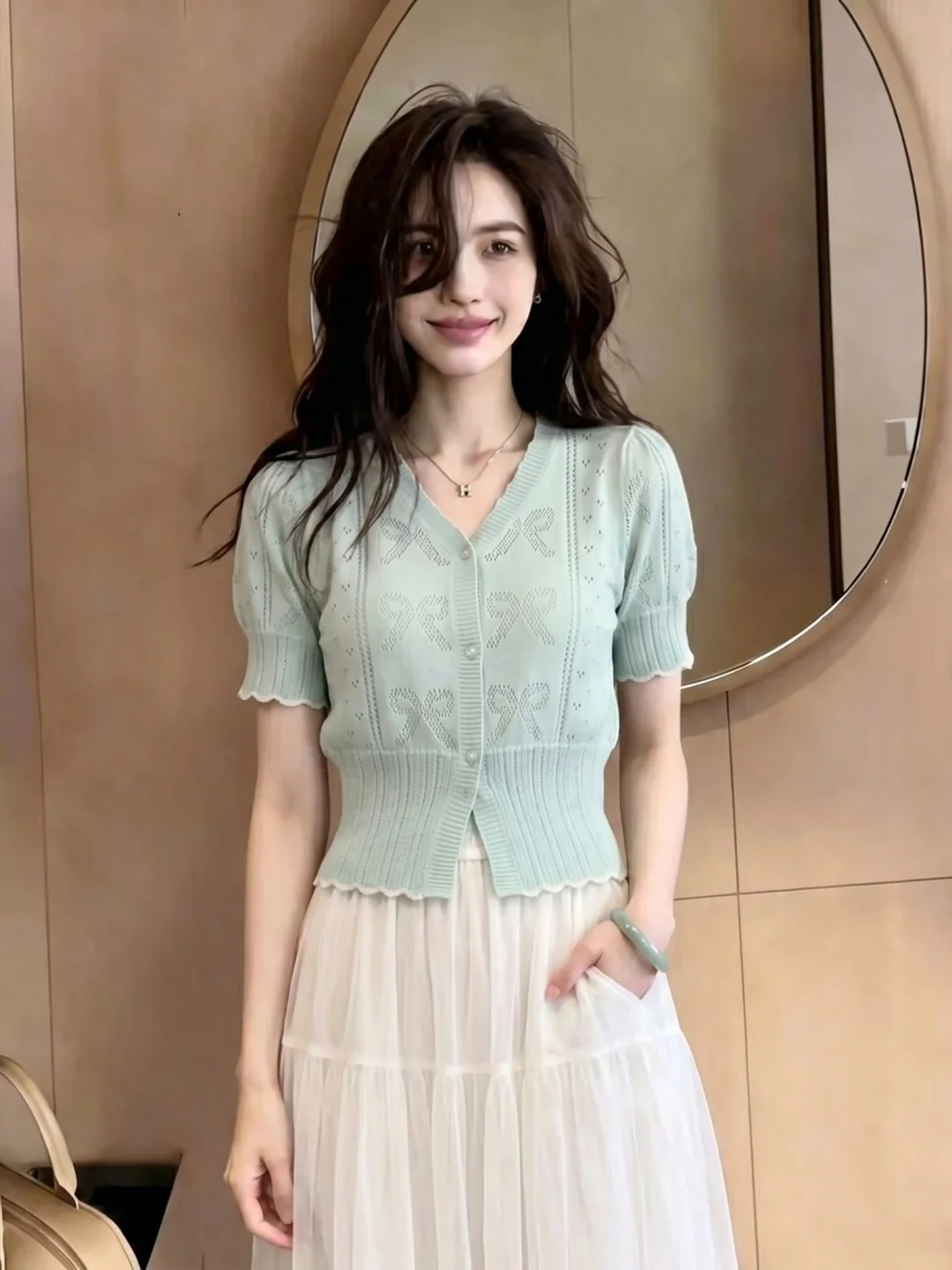 Elegant V-Neck Hollow out Knitted Cardigan Short Sleeve Summer Top for Women French Style Soft Fabric Knot Design
Elegant V-Neck Hollow out Knitted Cardigan Short Sleeve Summer Top for Women French Style Soft Fabric Knot Design