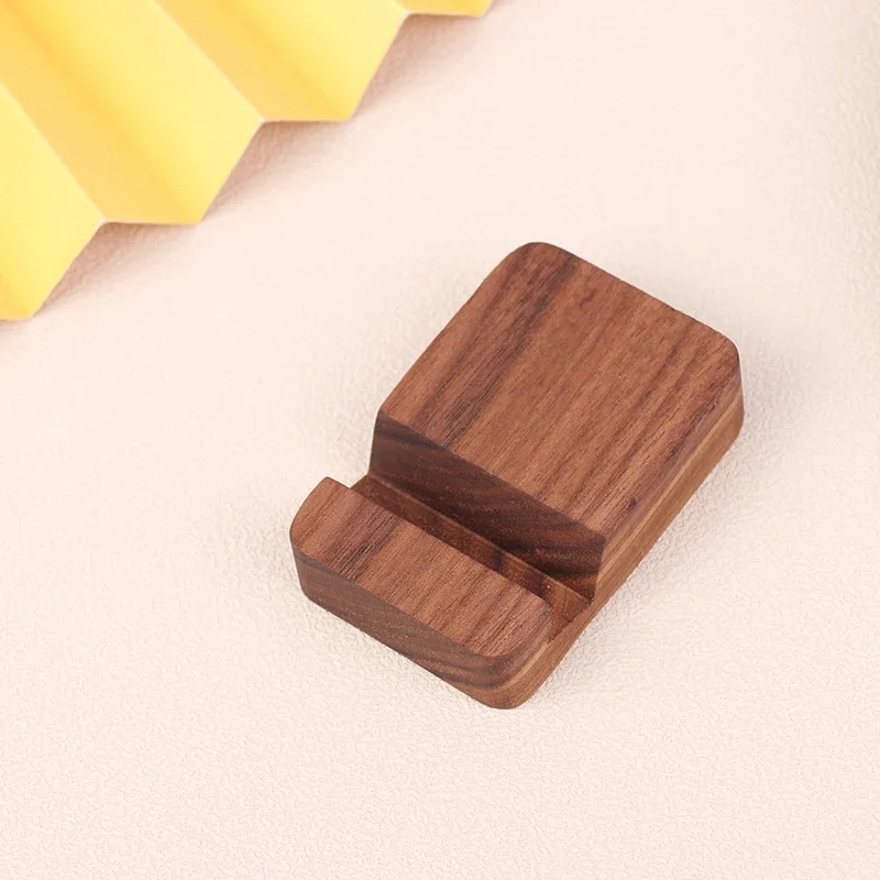1Pc Simple Universal Portable Solid Wood Cell Phone Racks Key Chain Desk Stand Holder for Mobile Phone Home Accessories 
1Pc Simple Universal Portable Solid Wood Cell Phone Racks Key Chain Desk Stand Holder for Mobile Phone Home Accessories