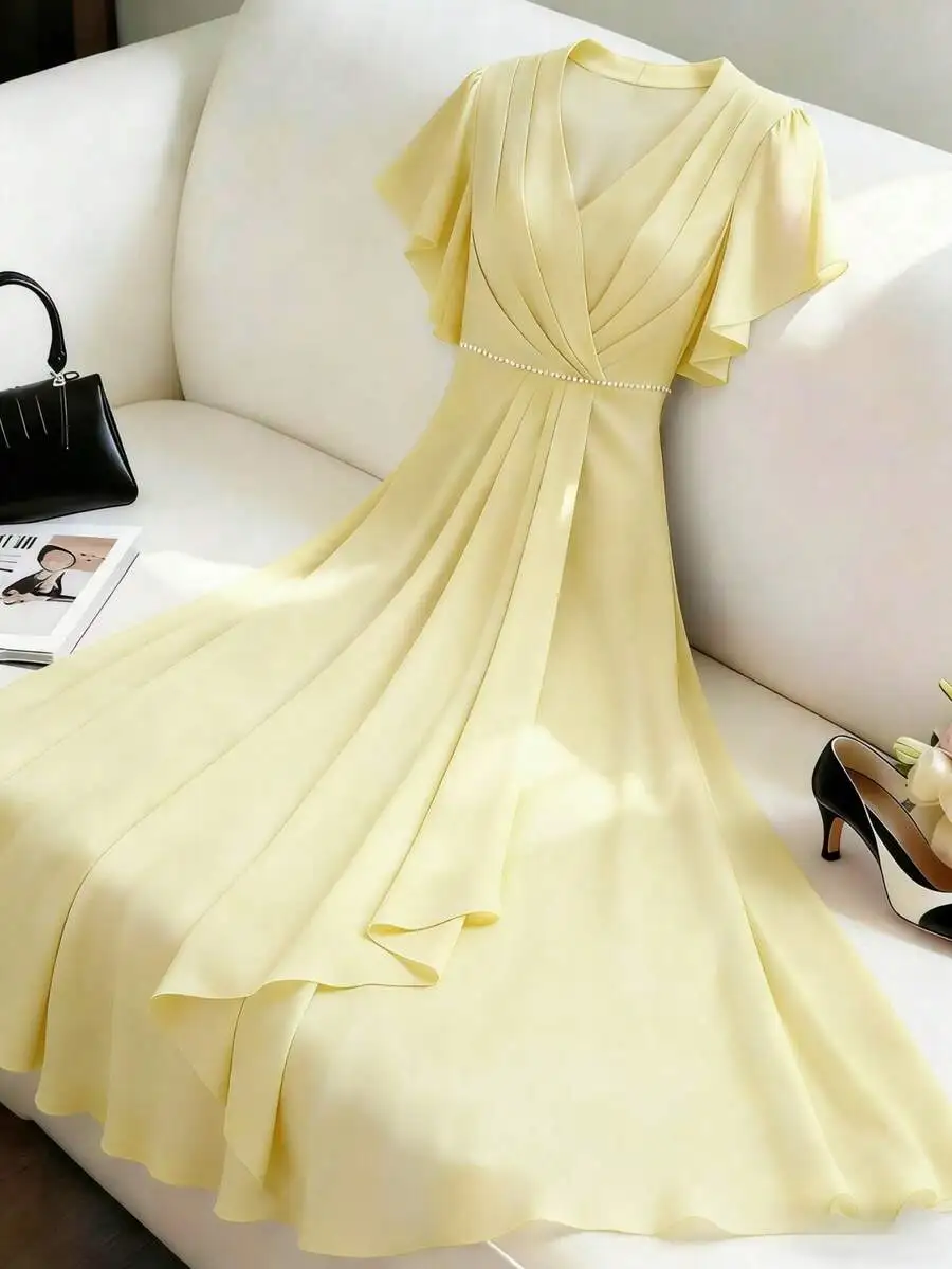 Elegant Yellow Chiffon V-Neck Cap Sleeve Pleated Dress With Pearl Waist Detail
Elegant Yellow Chiffon V-Neck Cap Sleeve Pleated Dress With Pearl Waist Detail
