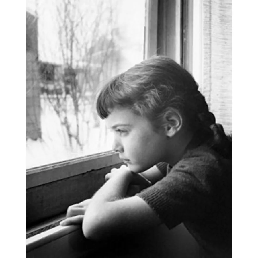 Girl leaning on sill looking out window Poster Print 24 x 36
Girl leaning on sill looking out window Poster Print 24 x 36