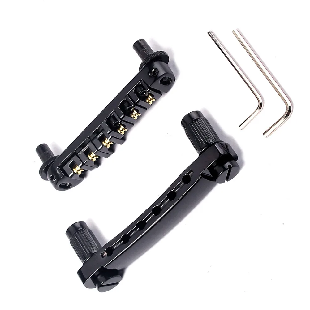 Roller Saddle Bridge Tailpiece Combo Kit Black Studs Wrenches for Style Electric Guitar Replacement Parts Tune Matic
Roller Saddle Bridge Tailpiece Combo Kit Black Studs Wrenches for Style Electric Guitar Replacement Parts Tune Matic
