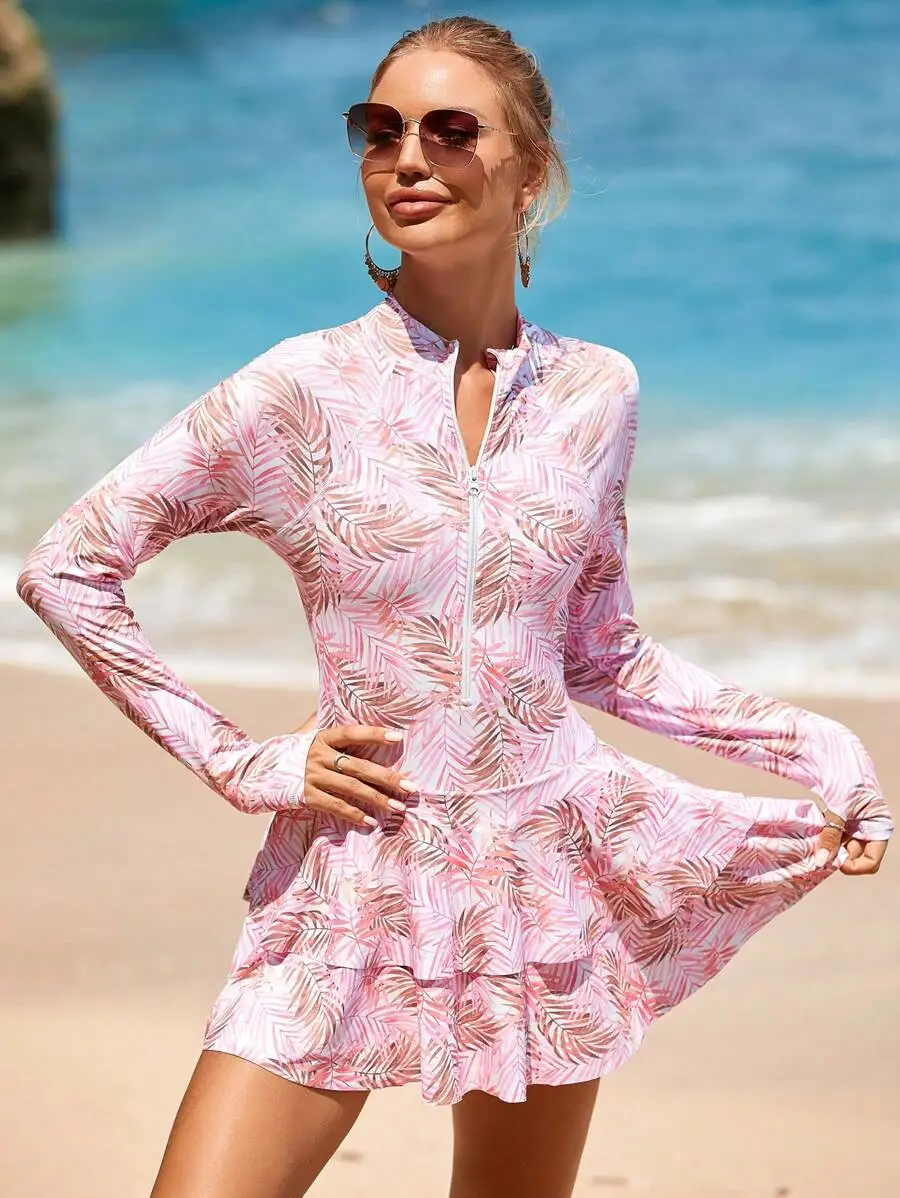 Pink Palm Print Modest Long Sleeve One-Piece Swimsuit With Front Zipper, Ruffled Hem And Full Coverage For Beach Vacation
Pink Palm Print Modest Long Sleeve One-Piece Swimsuit With Front Zipper, Ruffled Hem And Full Coverage For Beach Vacation