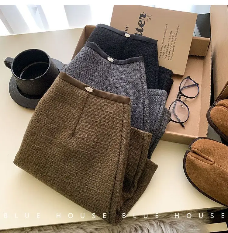 Winter new thickened woolen short skirt women's simple high waist and thin skirt casual versatile a-word skirt 
Winter new thickened woolen short skirt women's simple high waist and thin skirt casual versatile a-word skirt