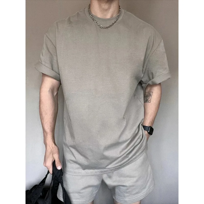 Men's American 2025 Summer Heavy Solid Color Small Neckline Short-sleeved T-shirt Summer Shorts Sports and Leisure Loose Suit
Men's American 2025 Summer Heavy Solid Color Small Neckline Short-sleeved T-shirt Summer Shorts Sports and Leisure Loose Suit