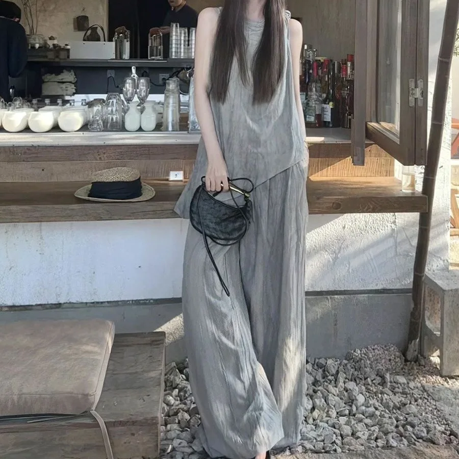 High-end French Relaxation Wear A Complete Set of Summer New Irregular Sleeveless Tops and Wide-leg Pants 2-piece Set
High-end French Relaxation Wear A Complete Set of Summer New Irregular Sleeveless Tops and Wide-leg Pants 2-piece Set