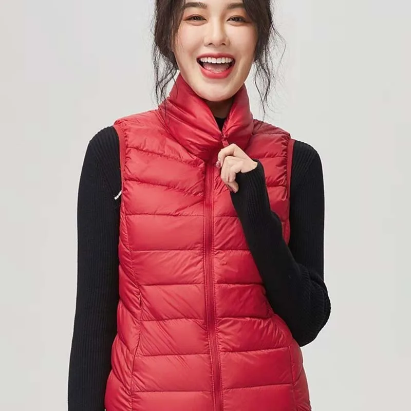 Autumn and Winter Lightweight Down Vest Korean Version Stand Up Collar Short Slim Fit Vest Jacket for Women
Autumn and Winter Lightweight Down Vest Korean Version Stand Up Collar Short Slim Fit Vest Jacket for Women