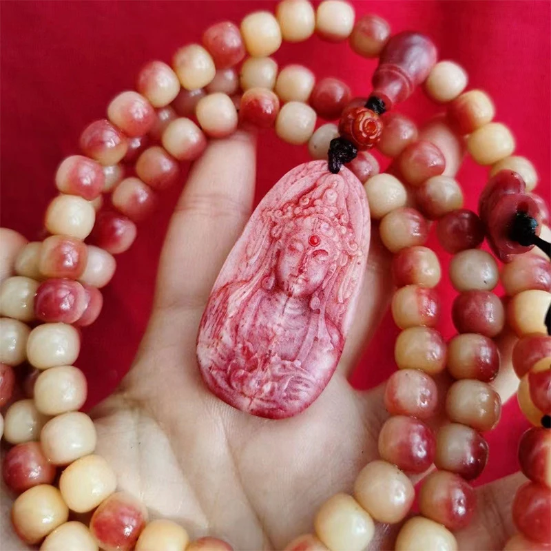 Blood bone bracelet, 9*8mm, 108 beads, with distinct tadpole pattern, paired with a matching three-way Guanyin pendant with a sl
Blood bone bracelet, 9*8mm, 108 beads, with distinct tadpole pattern, paired with a matching three-way Guanyin pendant with a sl