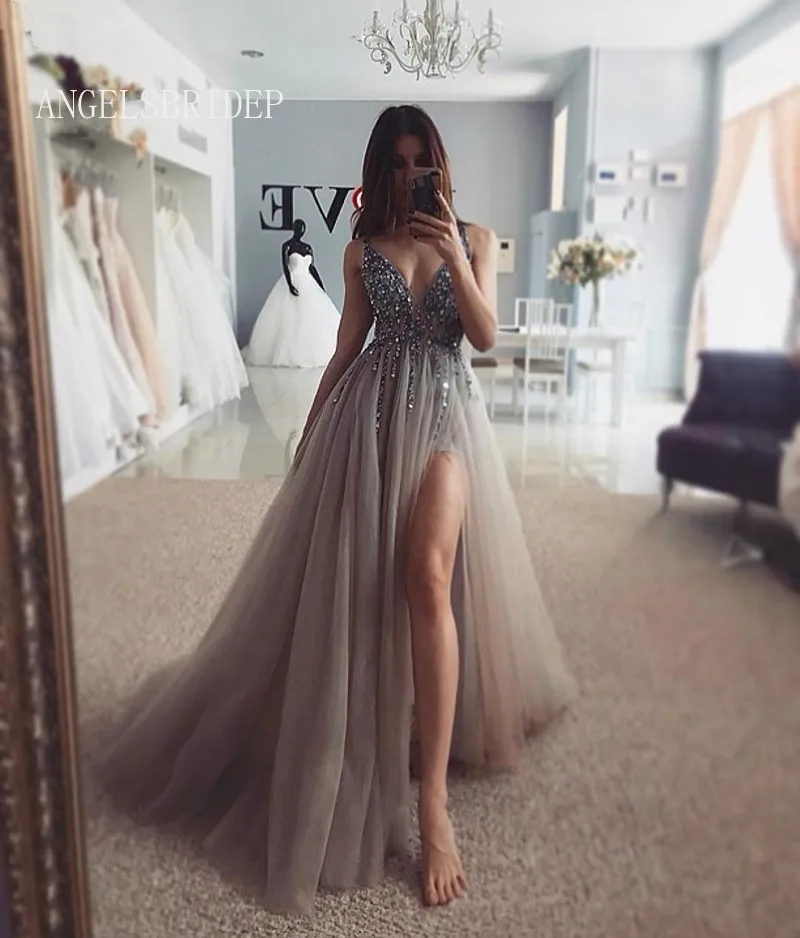 Angelsbridep Shiny Spaghetti Strap Long Tulle Crystal Prom Dresses Deep Sexy V-Neck A-Line Side Split Women Evening Party Dress
Angelsbridep Shiny Spaghetti Strap Long Tulle Crystal Prom Dresses Deep Sexy V-Neck A-Line Side Split Women Evening Party Dress